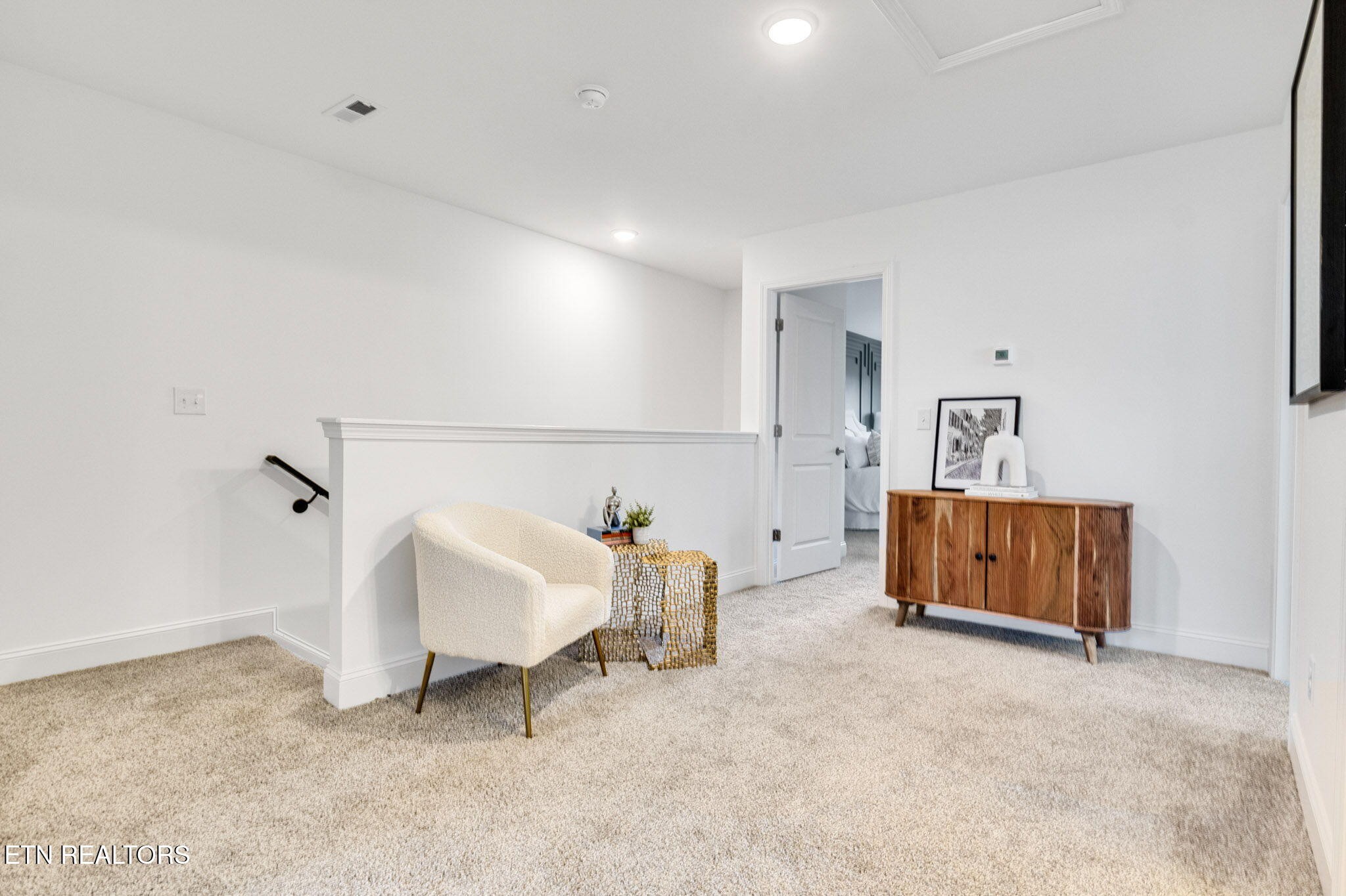 8418 Whisper Lane Powell, TN 37849 - Photo 18 of 42 a living room with furniture and a dresser