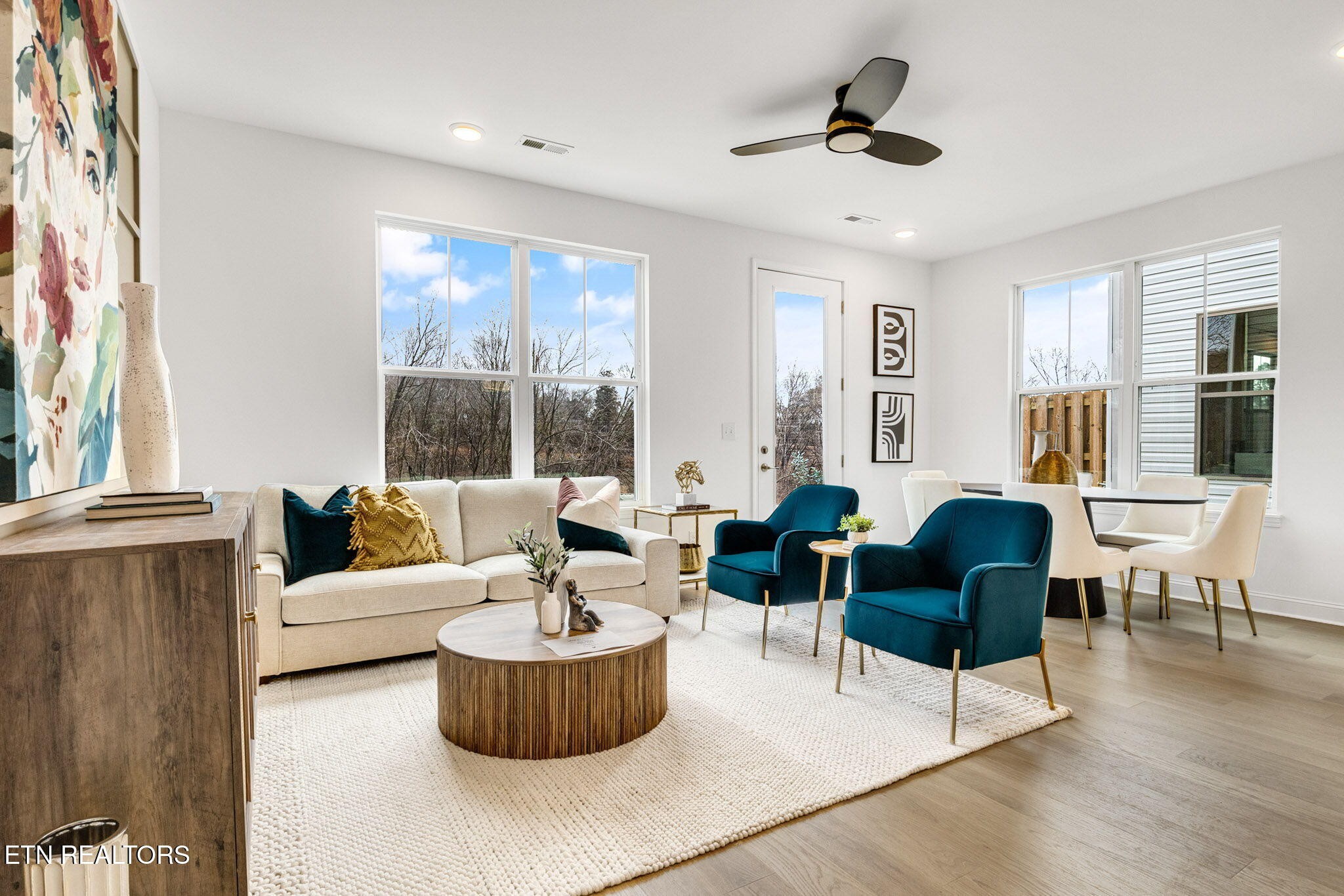 8418 Whisper Lane Powell, TN 37849 - Photo 3 of 42 a living room with furniture and a large window
