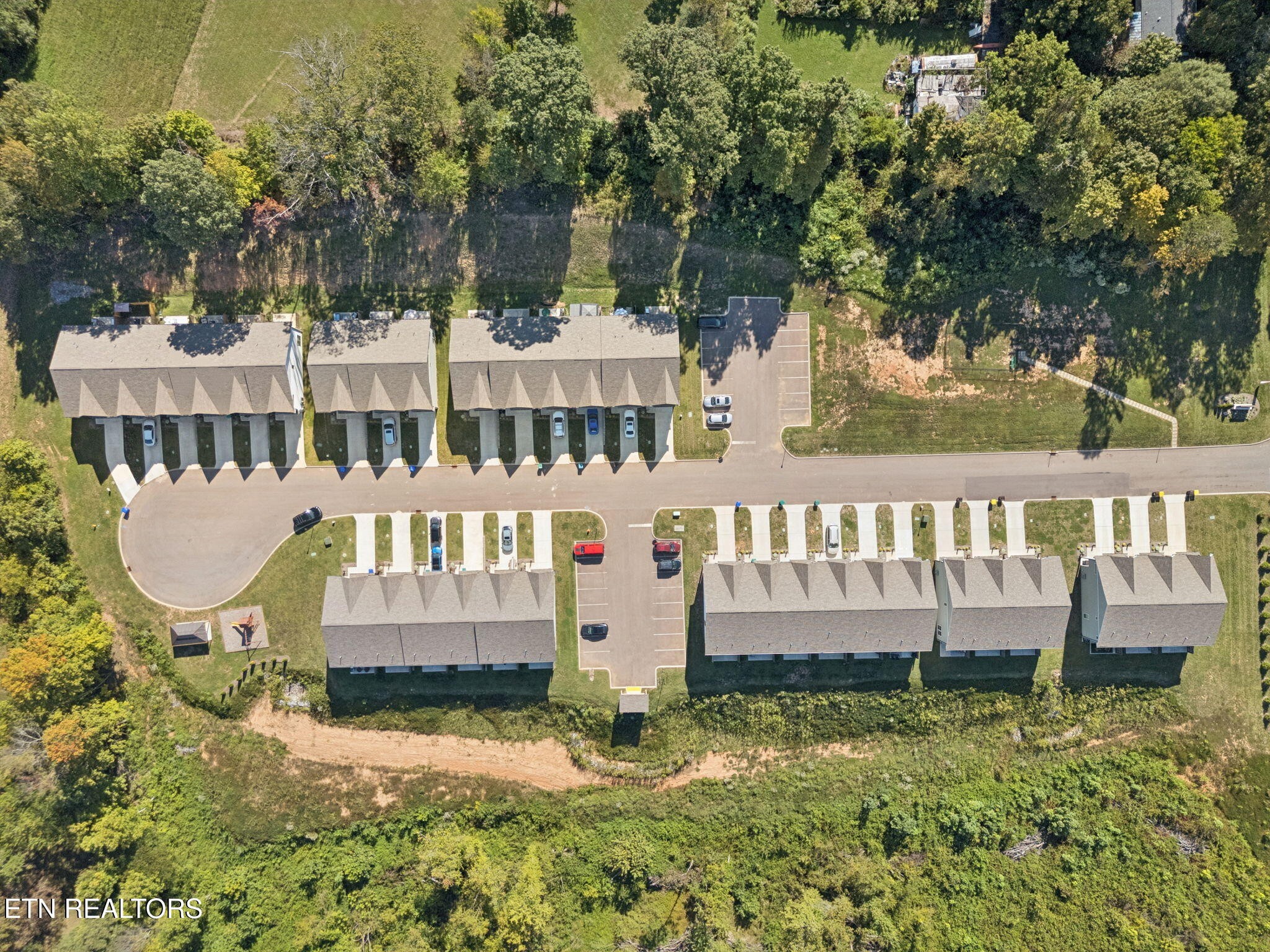 8418 Whisper Lane Powell, TN 37849 - Photo 37 of 42 a view of a house with a yard and sitting area