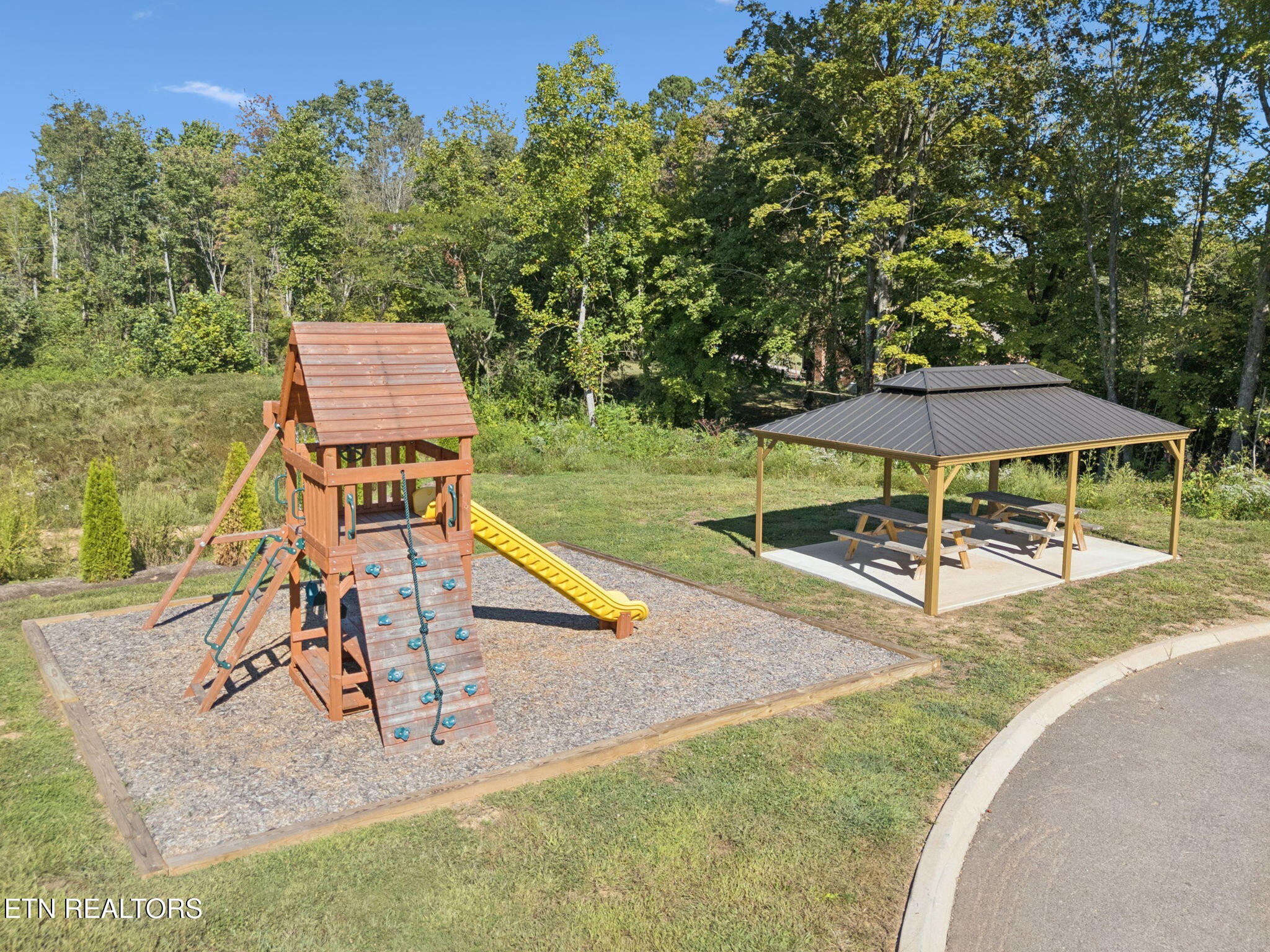 8418 Whisper Lane Powell, TN 37849 - Photo 39 of 42 a view of a swimming pool with a patio