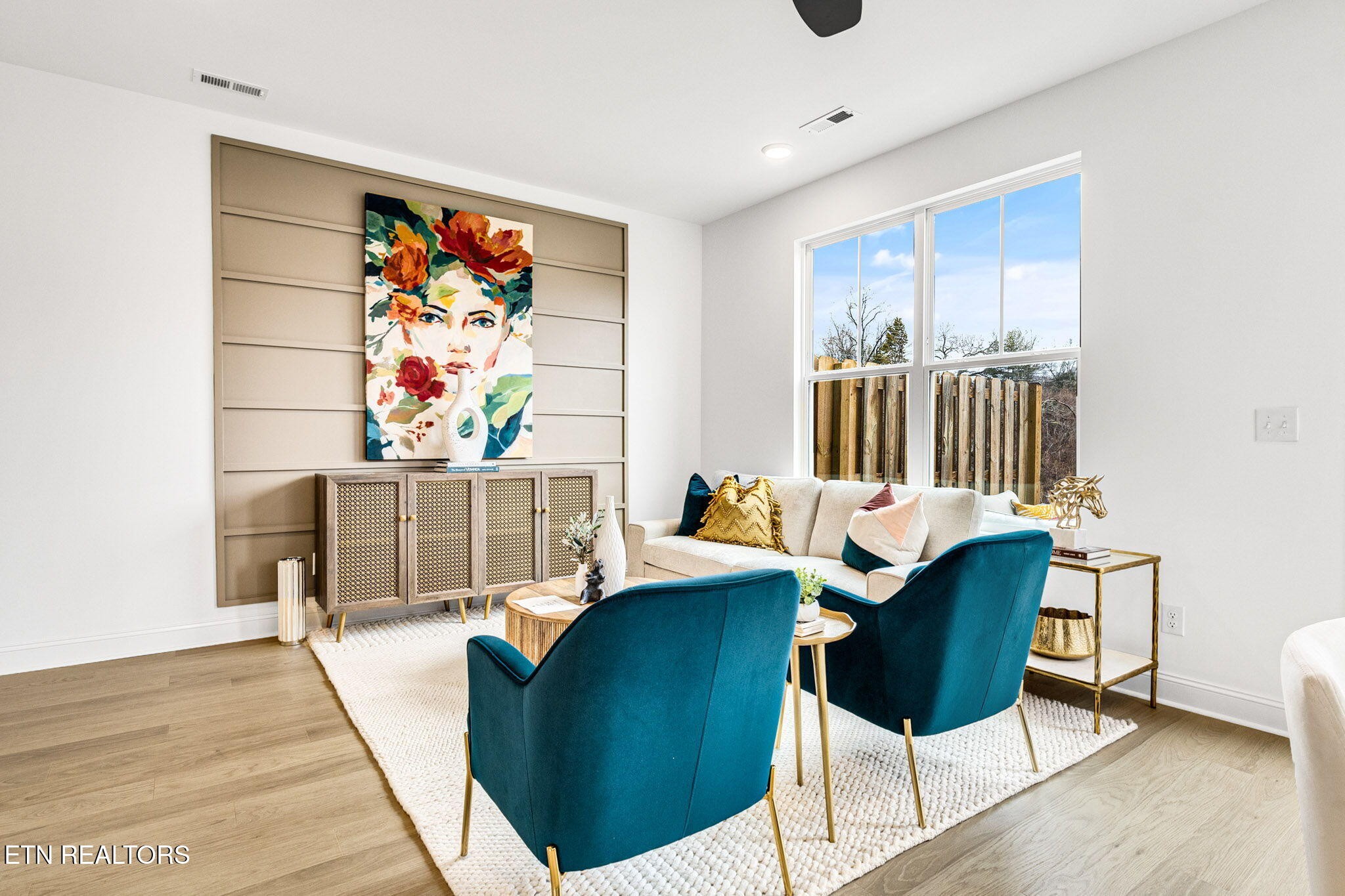 8418 Whisper Lane Powell, TN 37849 - Photo 4 of 42 a living room with furniture and a potted plant