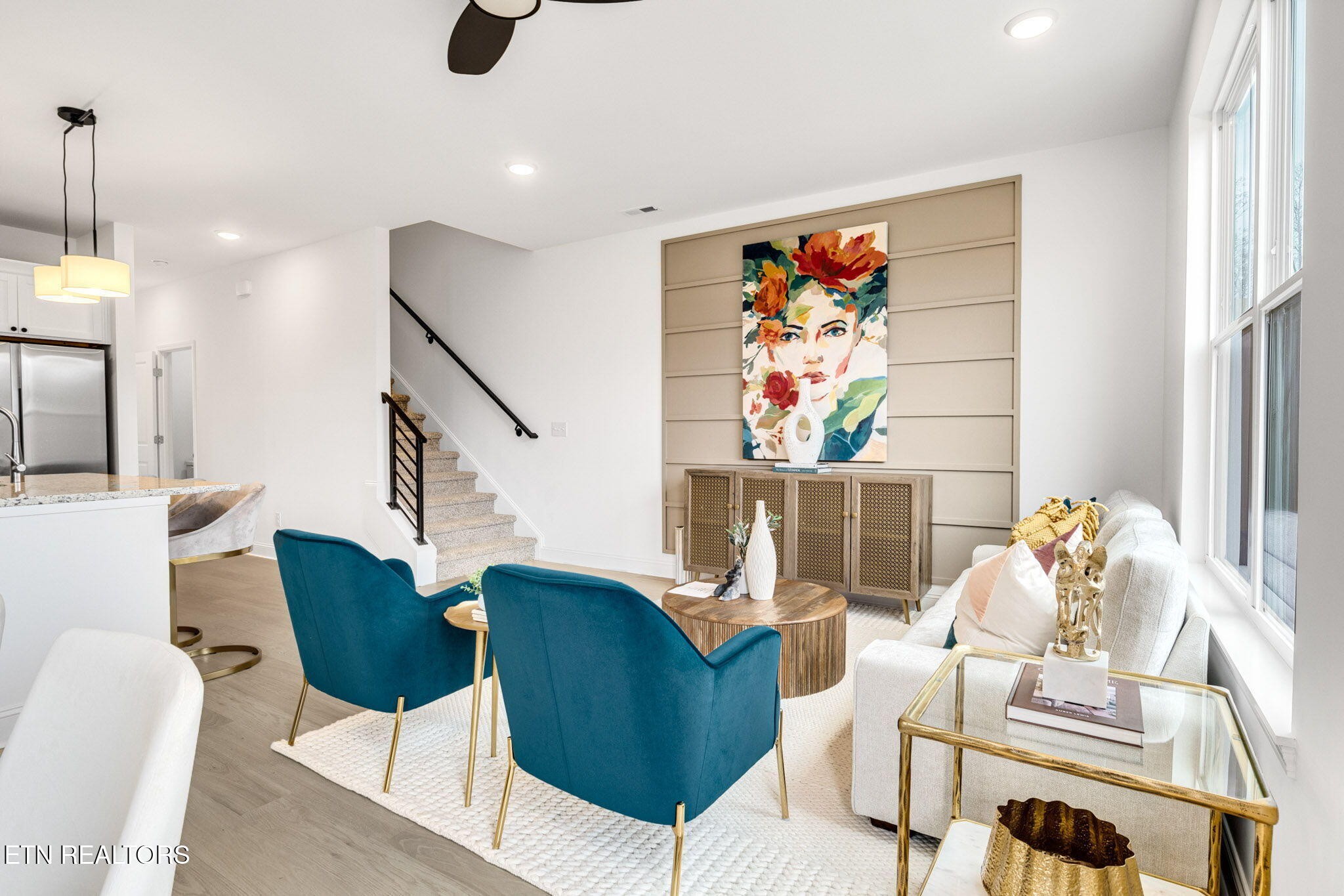 8418 Whisper Lane Powell, TN 37849 - Photo 7 of 42 a living room with furniture and a painting on the wall