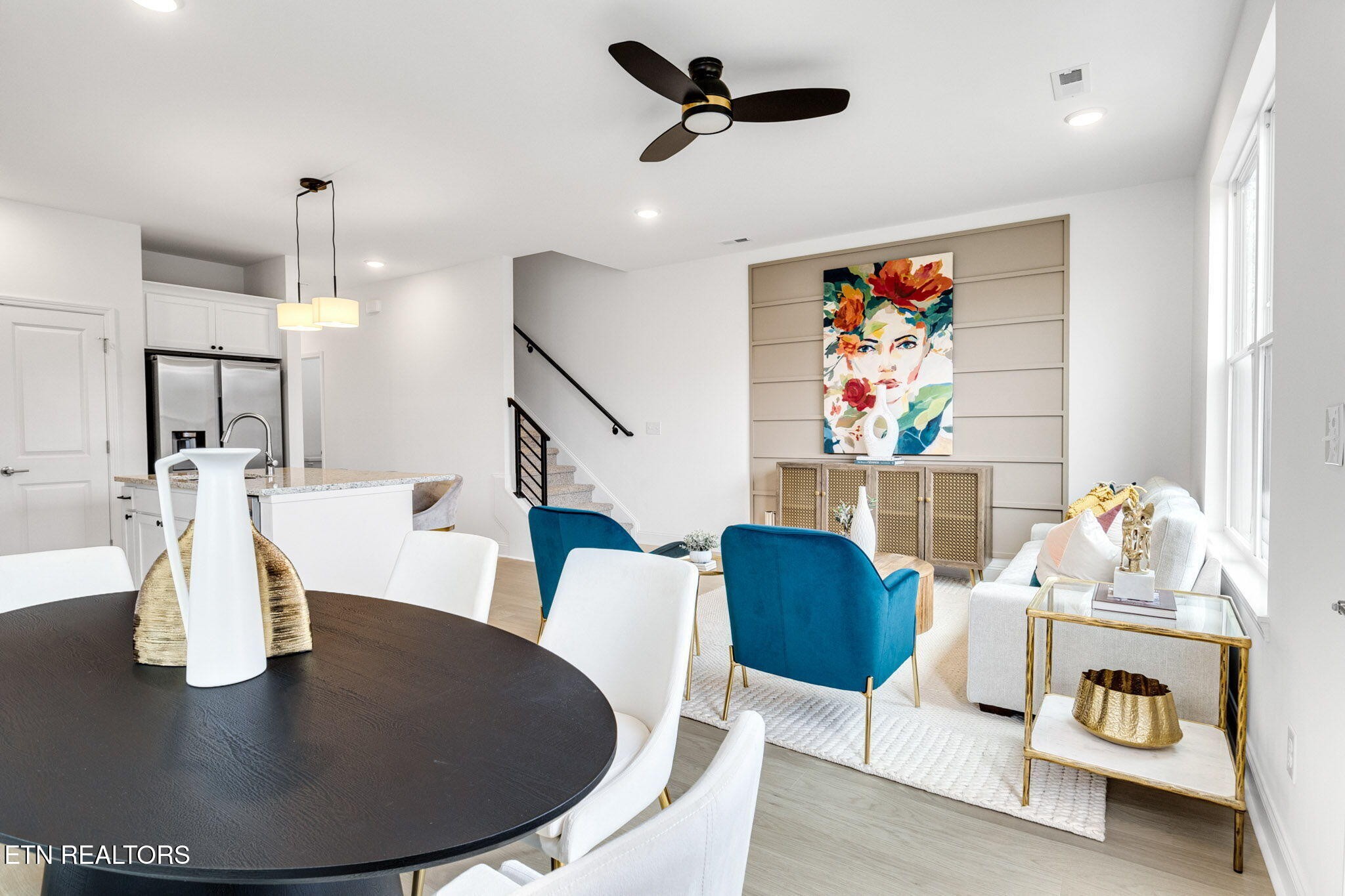 8418 Whisper Lane Powell, TN 37849 - Photo 8 of 42 a view of livingroom and dining room with furniture
