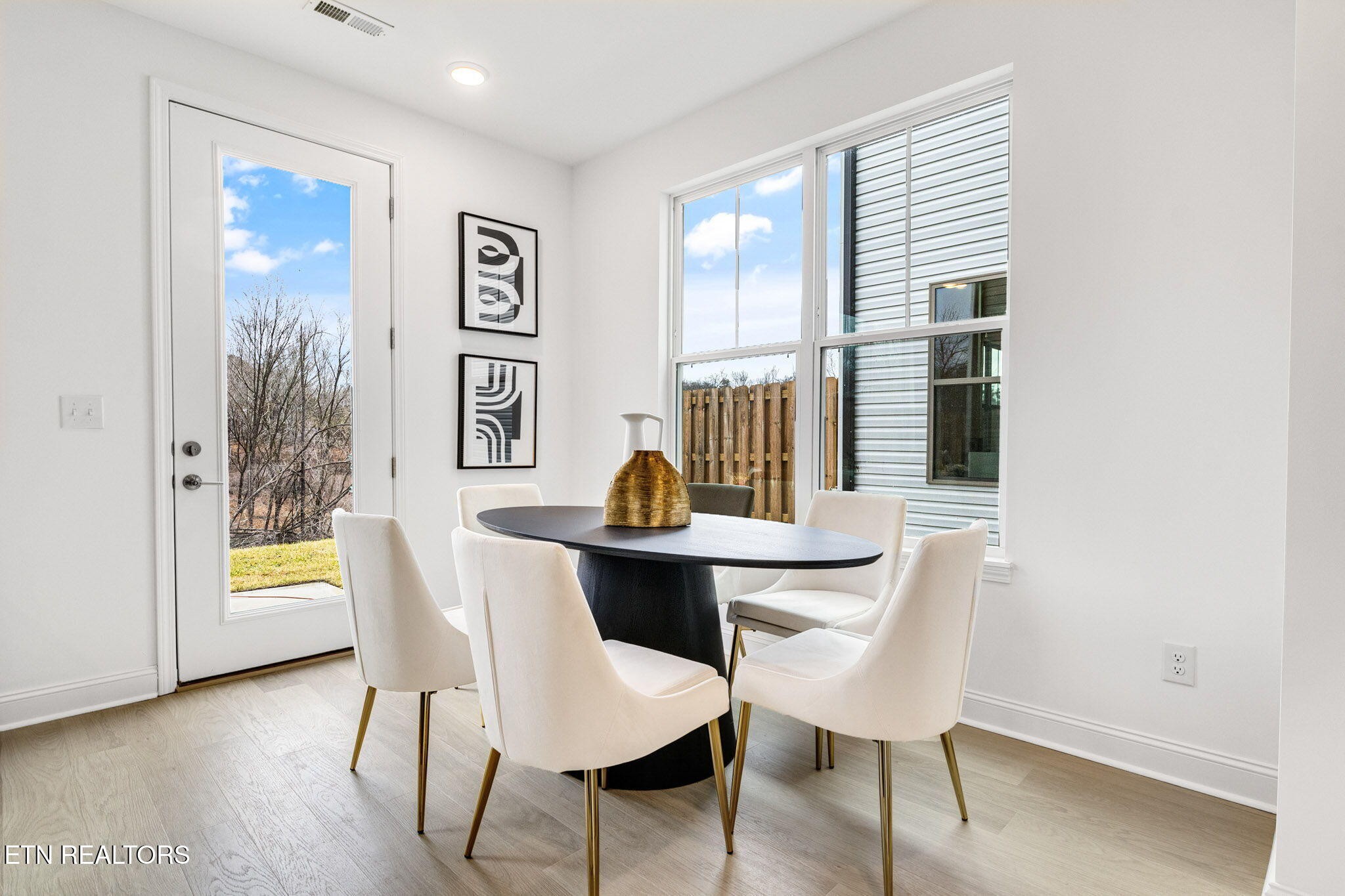 8418 Whisper Lane Powell, TN 37849 - Photo 9 of 42 a view of a dining room with furniture and window