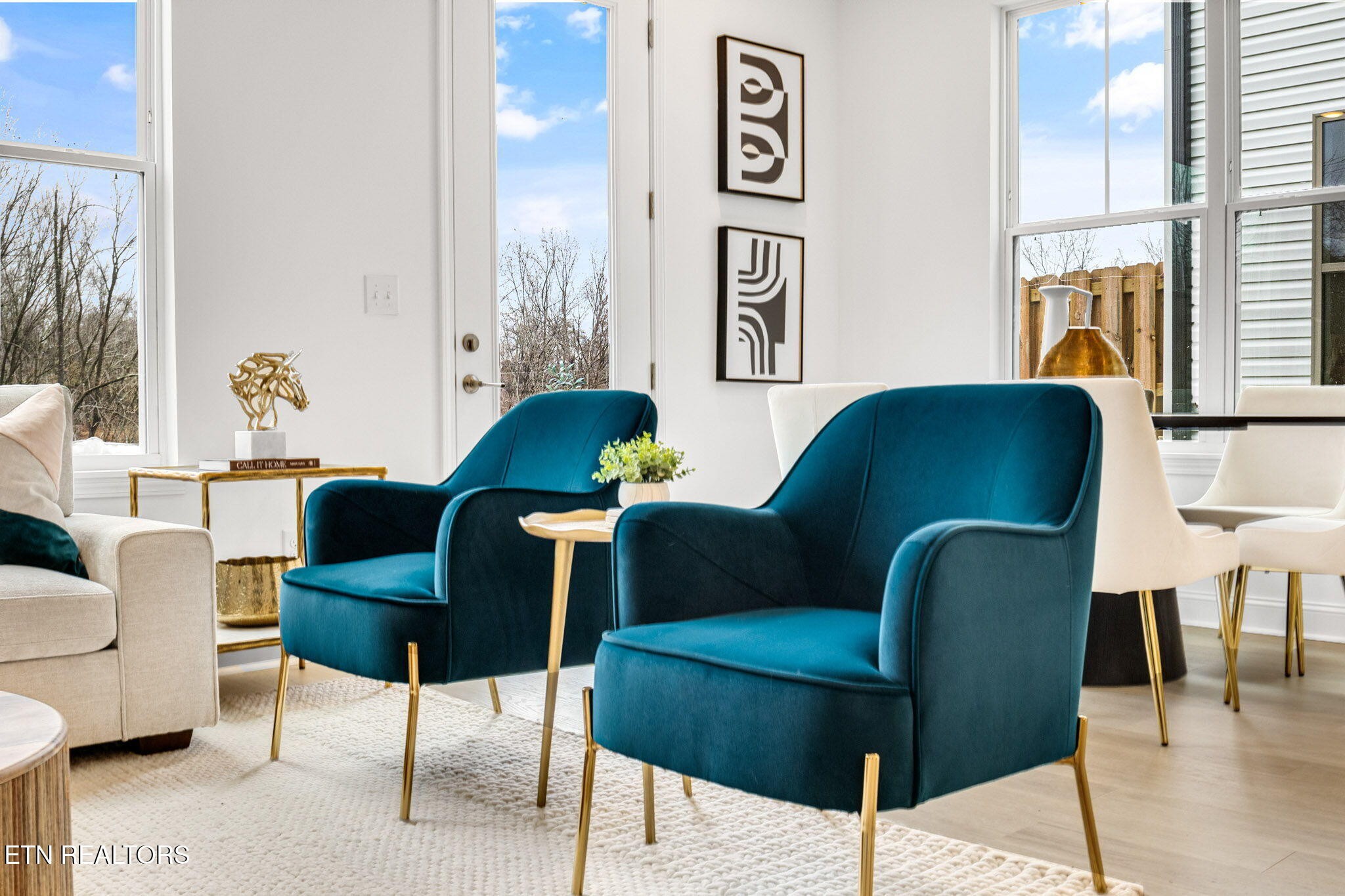 8418 Whisper Lane Powell, TN 37849 - Photo 10 of 42 a living room with furniture and a painting on the wall