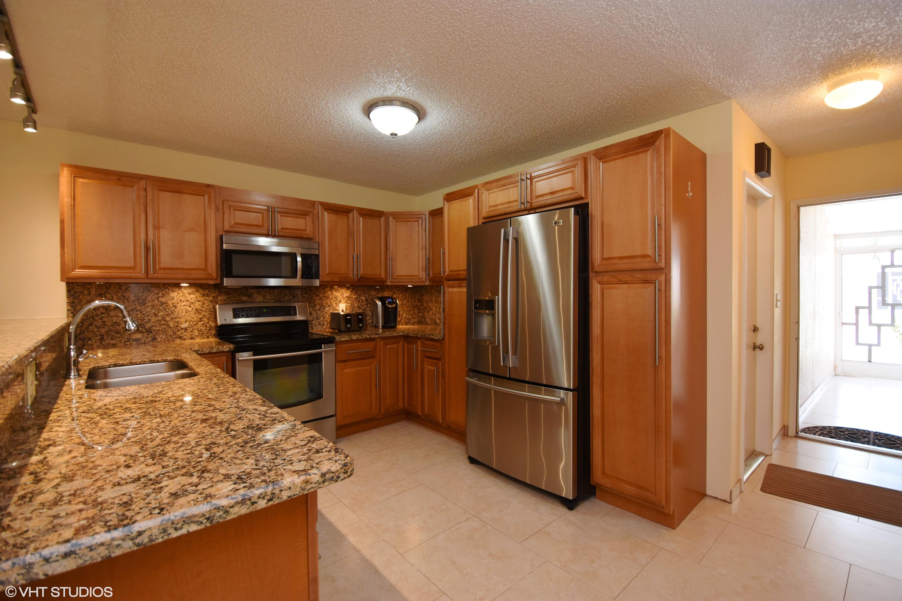 18820 Stewart Circle, Unit 4 Boca Raton, FL 33496 - Photo 3 of 27 04_18820StewartCir_Apt4_5_Kitchen_HiRes