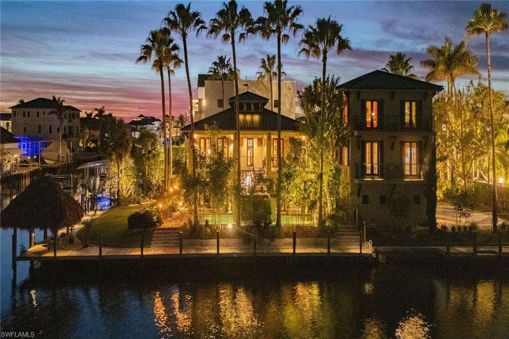 290 Channel Drive Naples, FL 34108 - Photo 2 of 49 a view of a lake