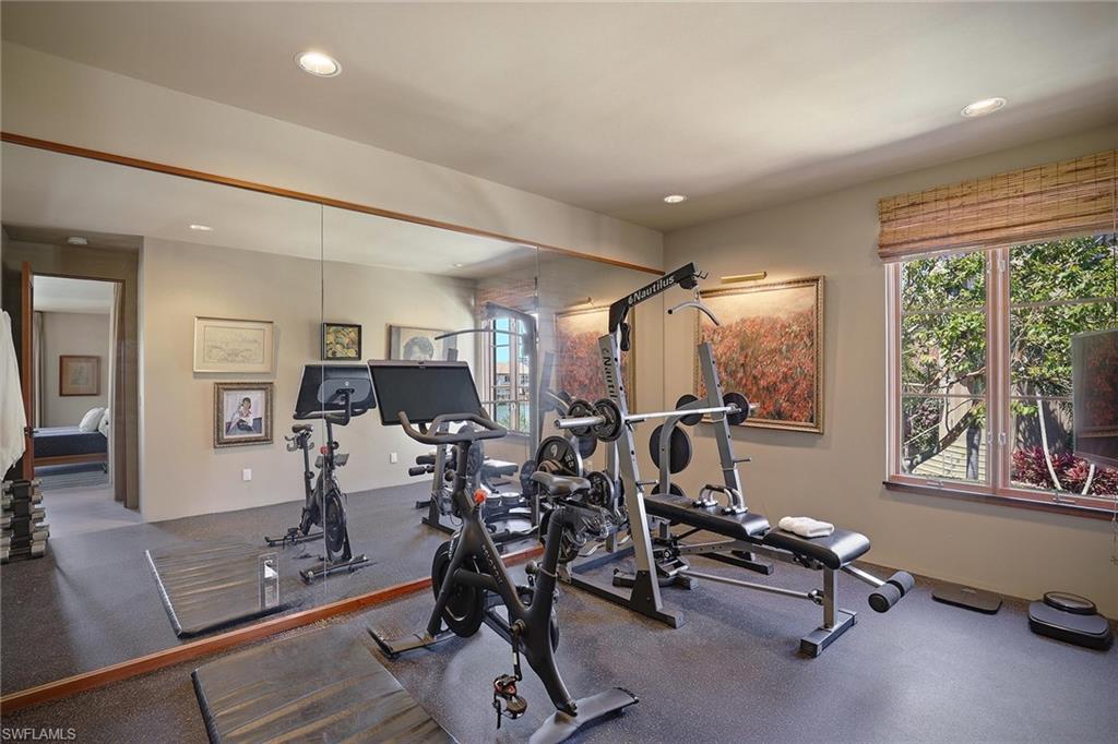 290 Channel Drive Naples, FL 34108 - Photo 23 of 45 a view of a room with gym equipment