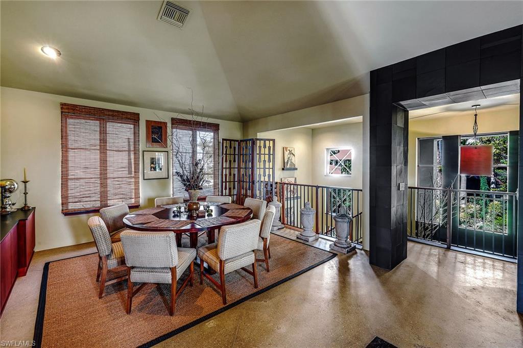 290 Channel Drive Naples, FL 34108 - Photo 24 of 49 a dining room with furniture and wooden floor