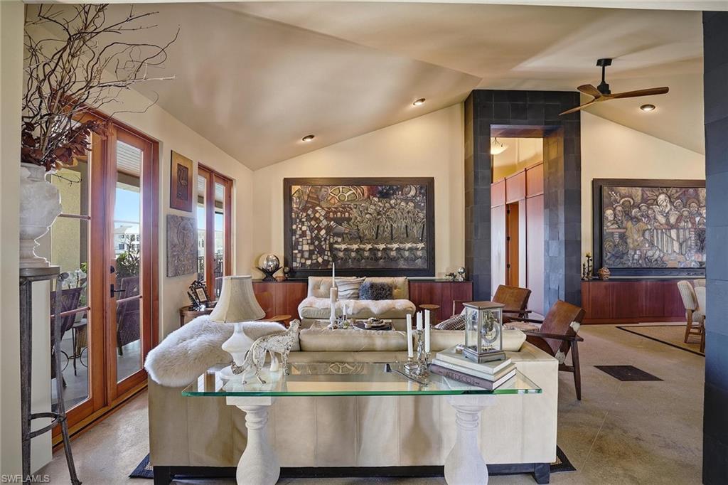 290 Channel Drive Naples, FL 34108 - Photo 24 of 45 a dining room with a large window and table