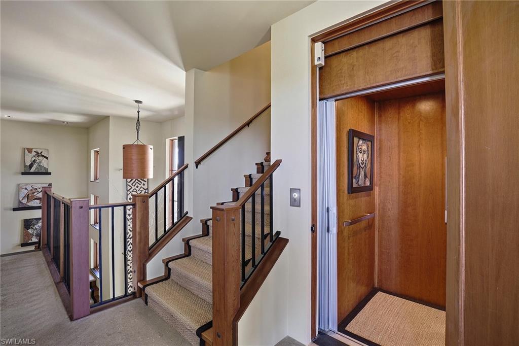 290 Channel Drive Naples, FL 34108 - Photo 26 of 45 a view of an entryway with stairs
