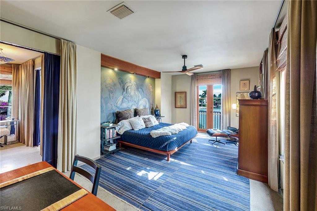 290 Channel Drive Naples, FL 34108 - Photo 29 of 49 a living room with furniture and a wooden floor