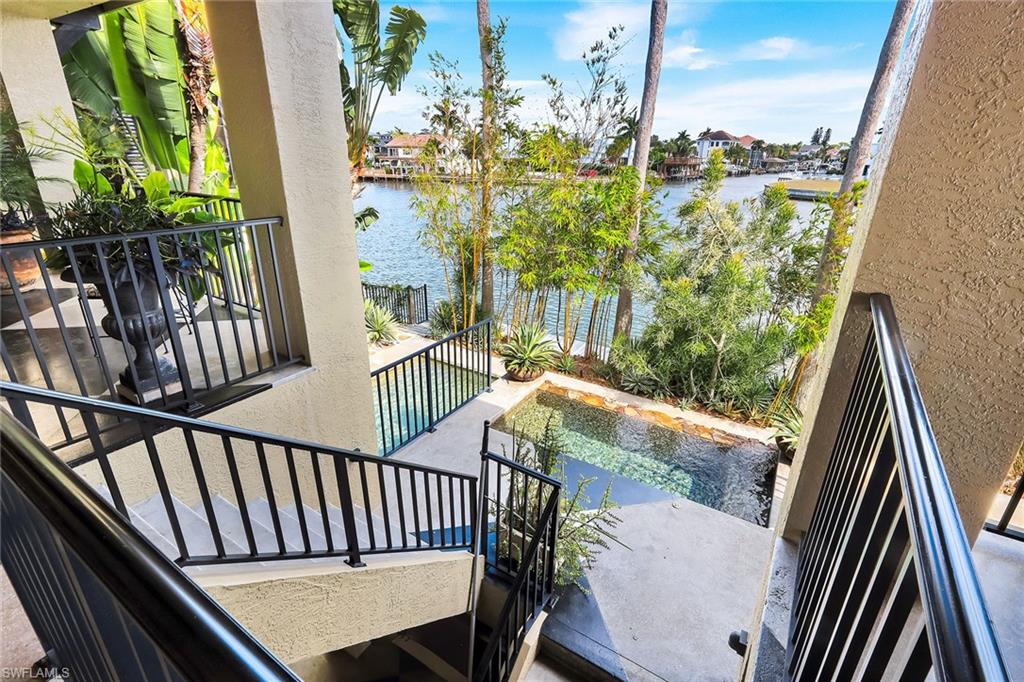 290 Channel Drive Naples, FL 34108 - Photo 33 of 49 a view of balcony with furniture