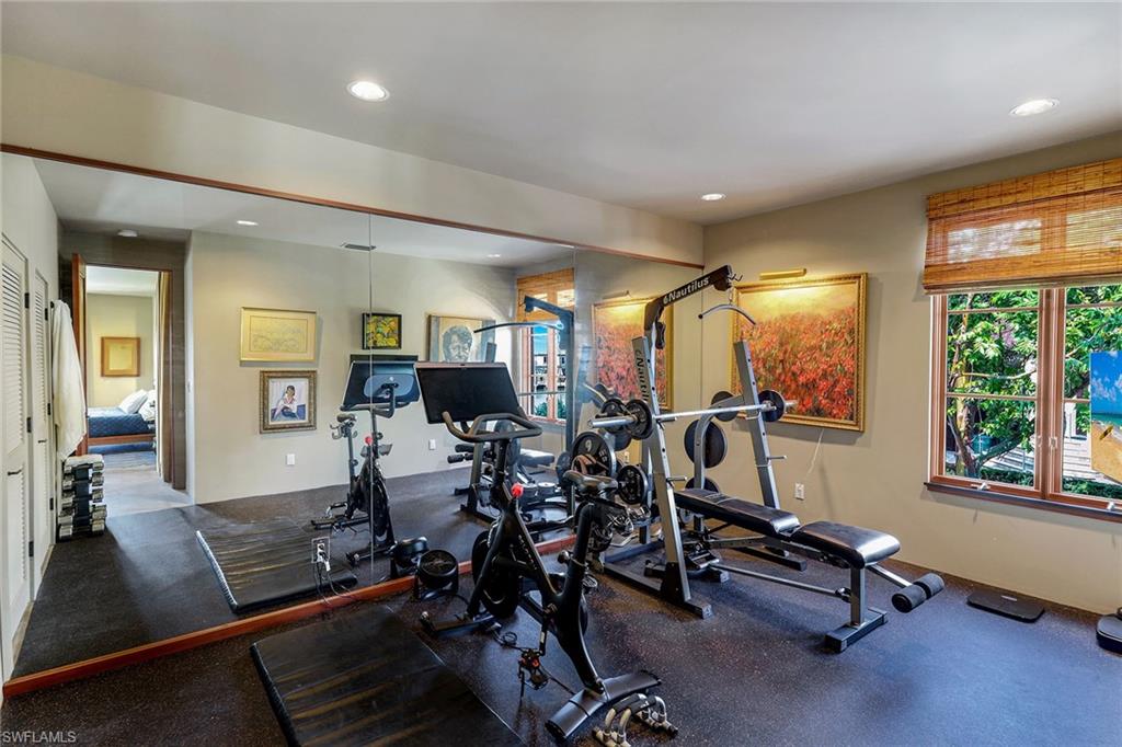 290 Channel Drive Naples, FL 34108 - Photo 35 of 49 a view of a room with gym equipment