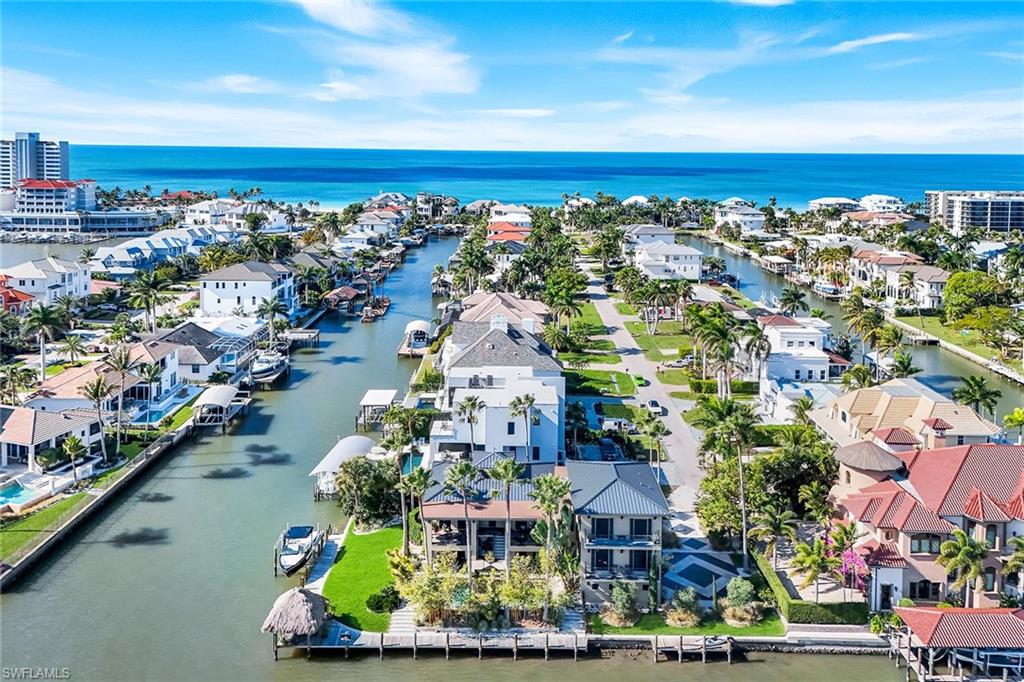 290 Channel Drive Naples, FL 34108 - Photo 5 of 49 a view of a city with tall buildings