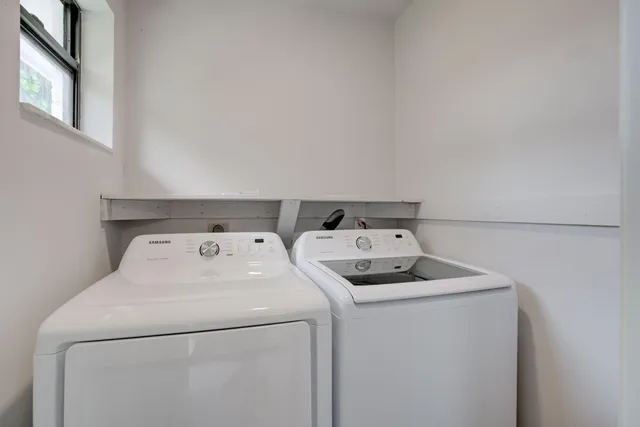 a utility room with dryer and washer