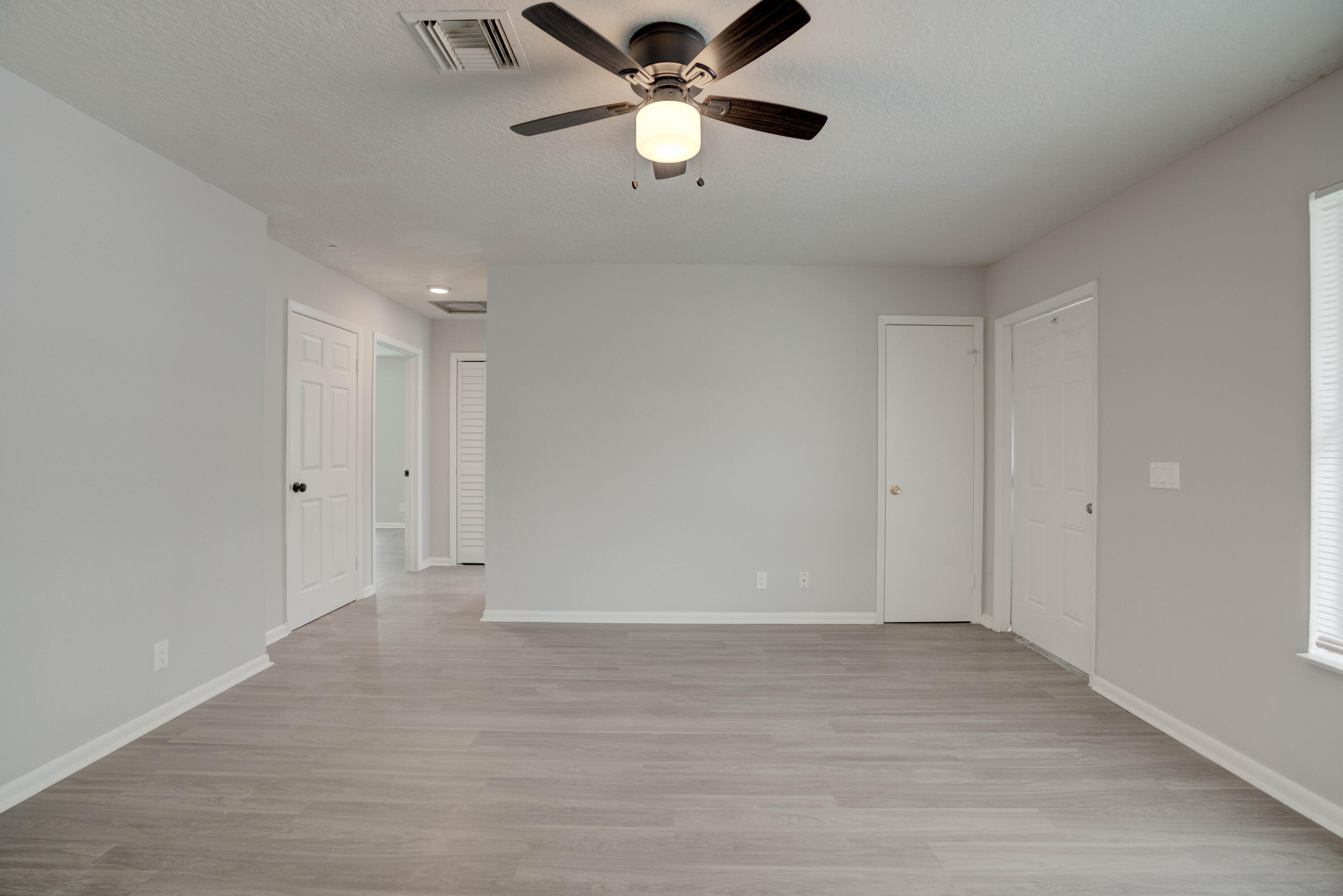 6567 Jupiter Gardens Boulevard, Unit 7 Jupiter, FL 33458 - Photo 10 of 20 a view of an empty room