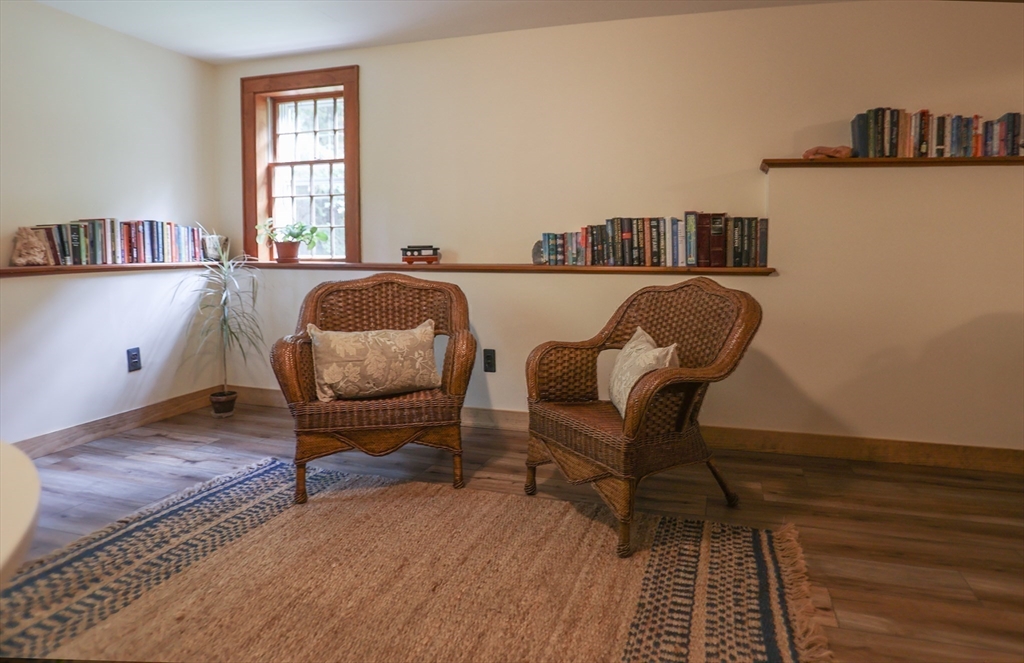 171 Wilder Road Bolton, MA 01740 - Photo 27 of 34 a living room with furniture and a window
