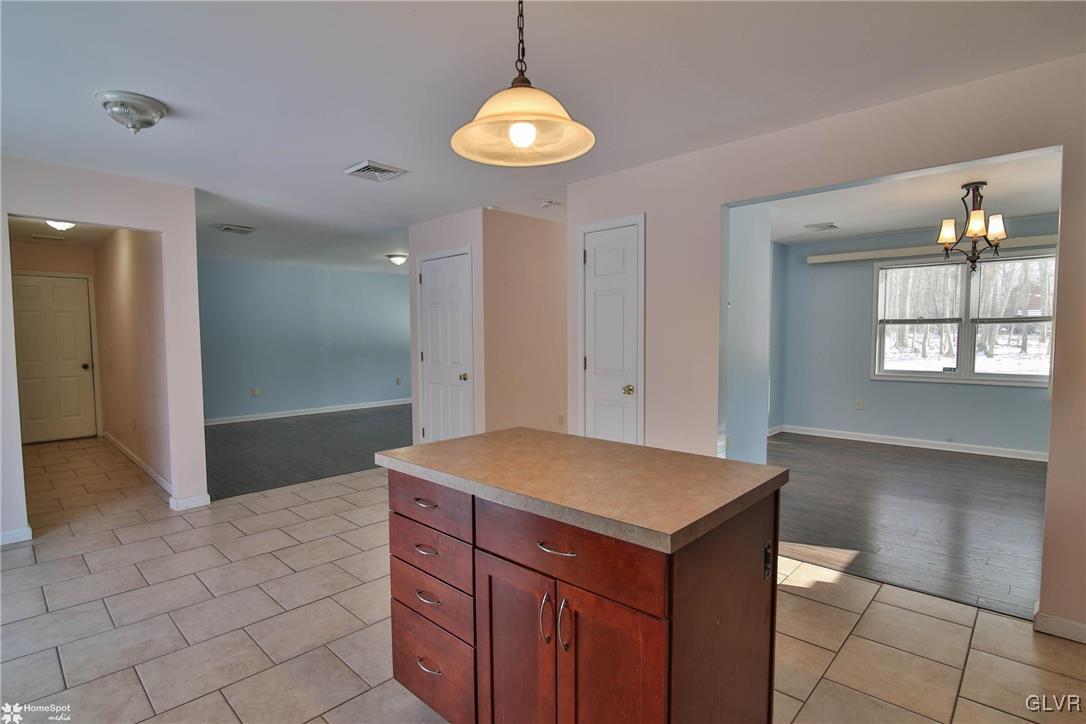 185 Sunset Road East Stroudsburg, PA 18302 - Photo 17 of 49 a bathroom with a sink a vanity and a mirror