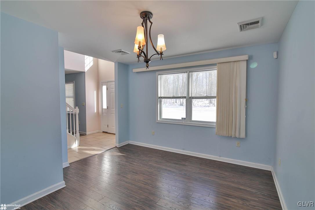 185 Sunset Road East Stroudsburg, PA 18302 - Photo 20 of 49 wooden floor in an empty room with a window