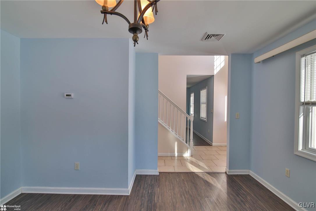 185 Sunset Road East Stroudsburg, PA 18302 - Photo 21 of 49 a view of a hallway with wooden floor and a window