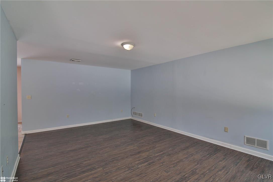 185 Sunset Road East Stroudsburg, PA 18302 - Photo 23 of 49 a view of an empty room with wooden floor