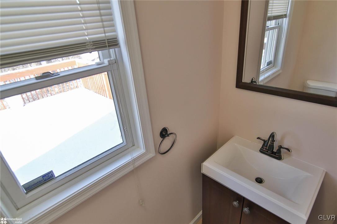 185 Sunset Road East Stroudsburg, PA 18302 - Photo 25 of 49 a bathroom with a sink and a window