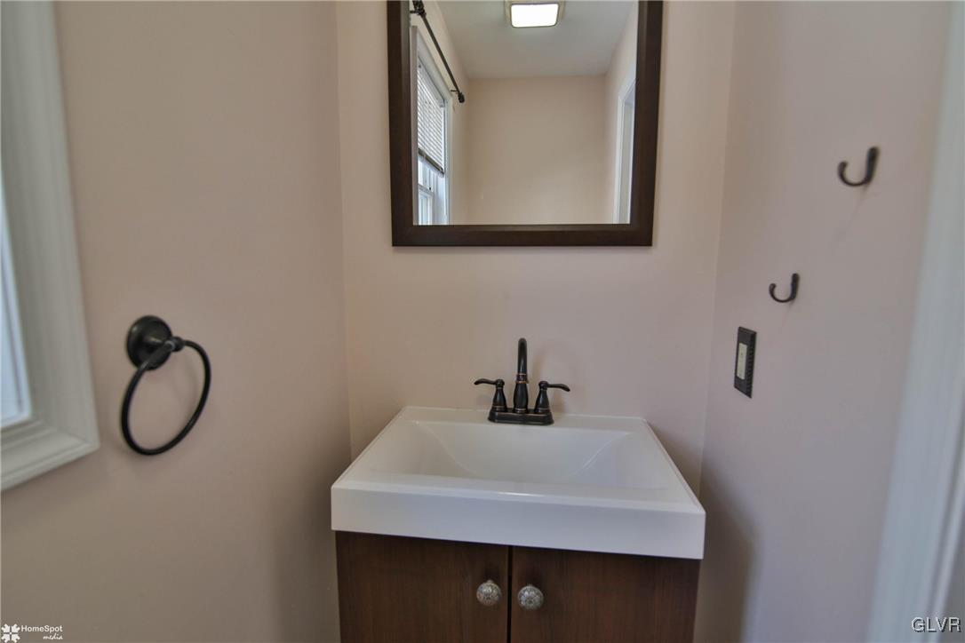 185 Sunset Road East Stroudsburg, PA 18302 - Photo 26 of 49 a bathroom with a sink and a mirror