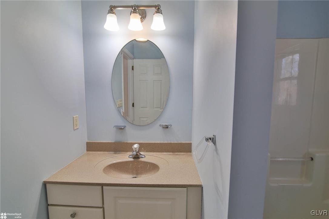 185 Sunset Road East Stroudsburg, PA 18302 - Photo 28 of 49 a bathroom with a sink and a mirror