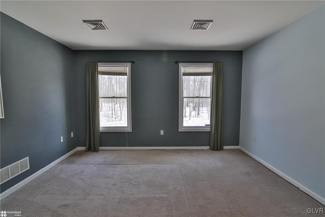 185 Sunset Road East Stroudsburg, PA 18302 - Photo 31 of 49 an empty room with windows