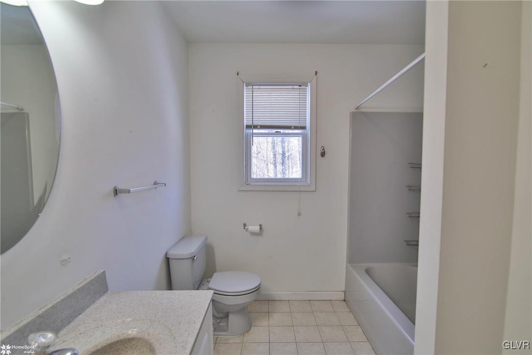 185 Sunset Road East Stroudsburg, PA 18302 - Photo 35 of 49 a bathroom with a toilet and a shower