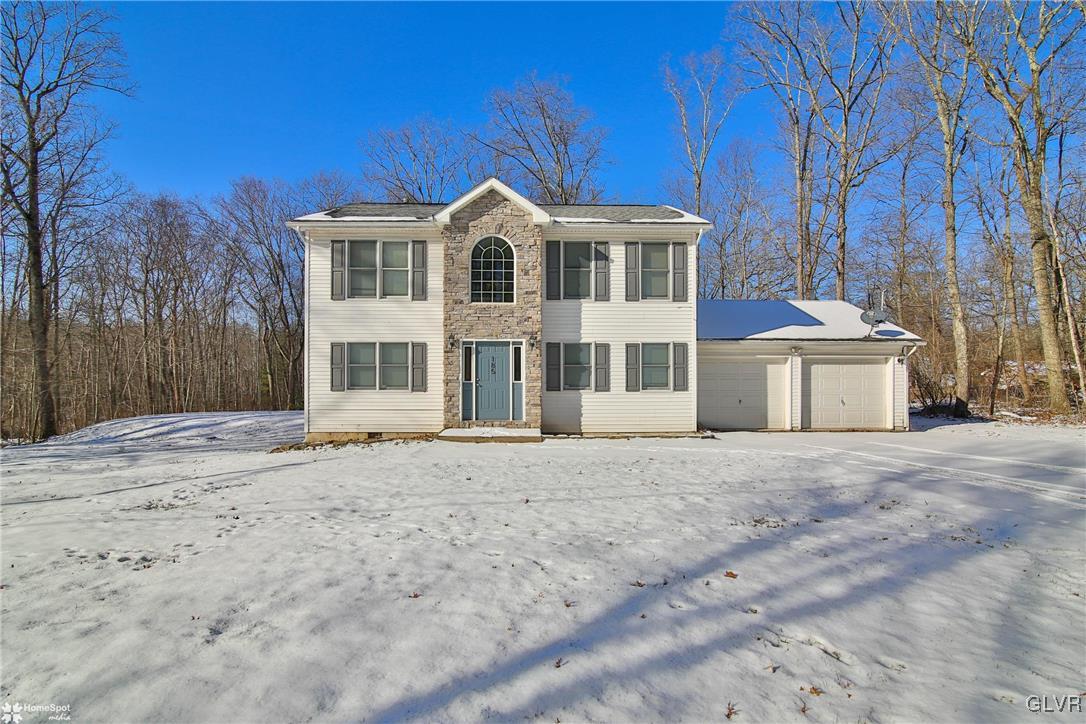 185 Sunset Road East Stroudsburg, PA 18302 - Photo 6 of 49 a front view of a house with a yard