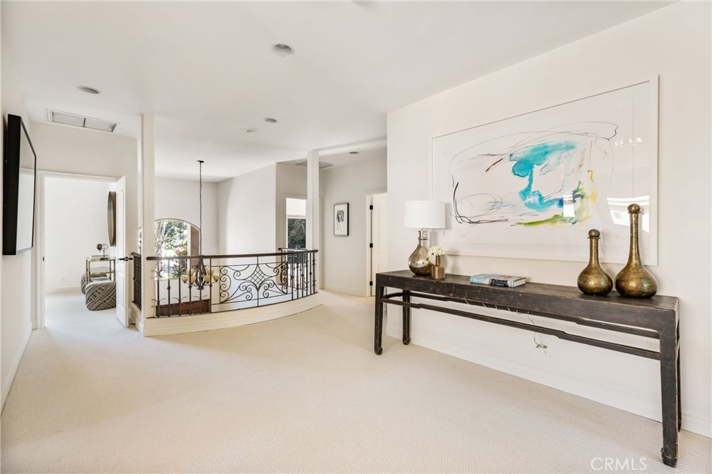 16659 Addison Street Encino, CA 91436 - Photo 24 of 48 a very nice looking room with a large mirror and potted plant on the counter