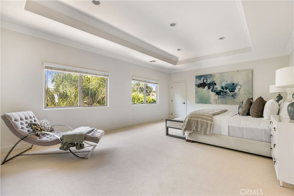 16659 Addison Street Encino, CA 91436 - Photo 34 of 48 a living room with furniture and a window