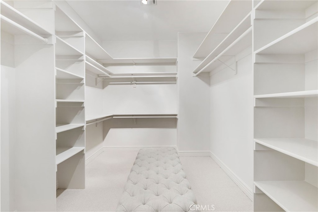 16659 Addison Street Encino, CA 91436 - Photo 37 of 48 a view of an empty walk in closet