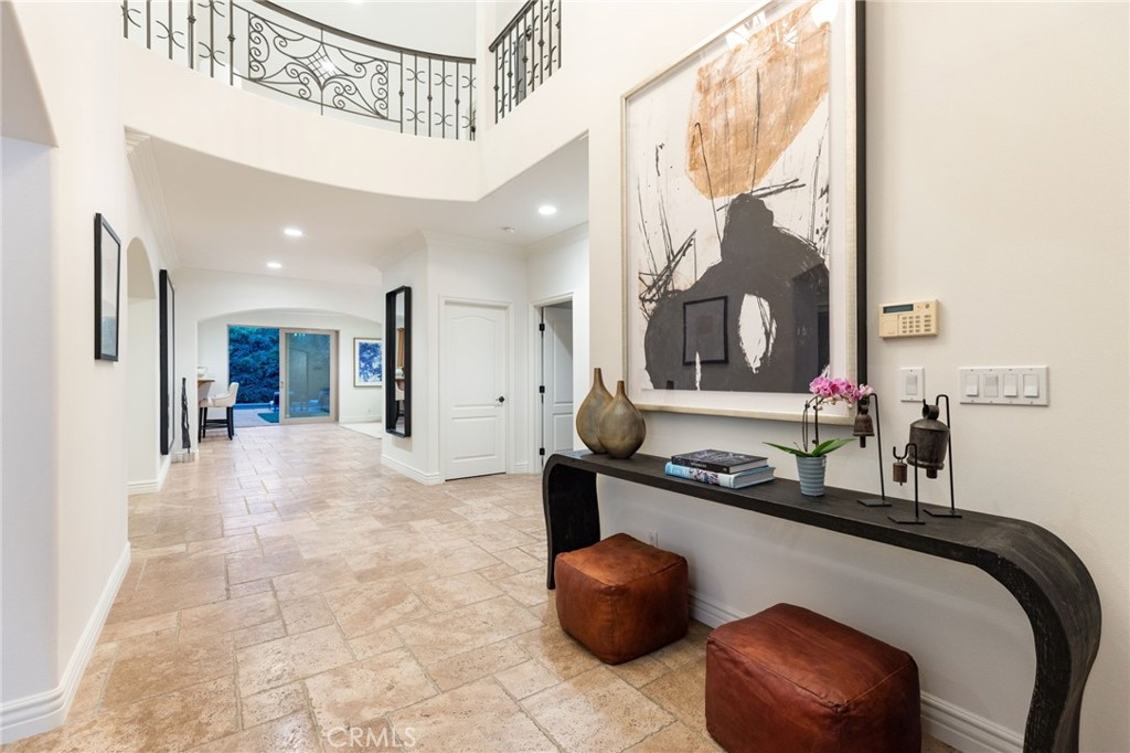 16659 Addison Street Encino, CA 91436 - Photo 5 of 48 a dining room with furniture and a mirror