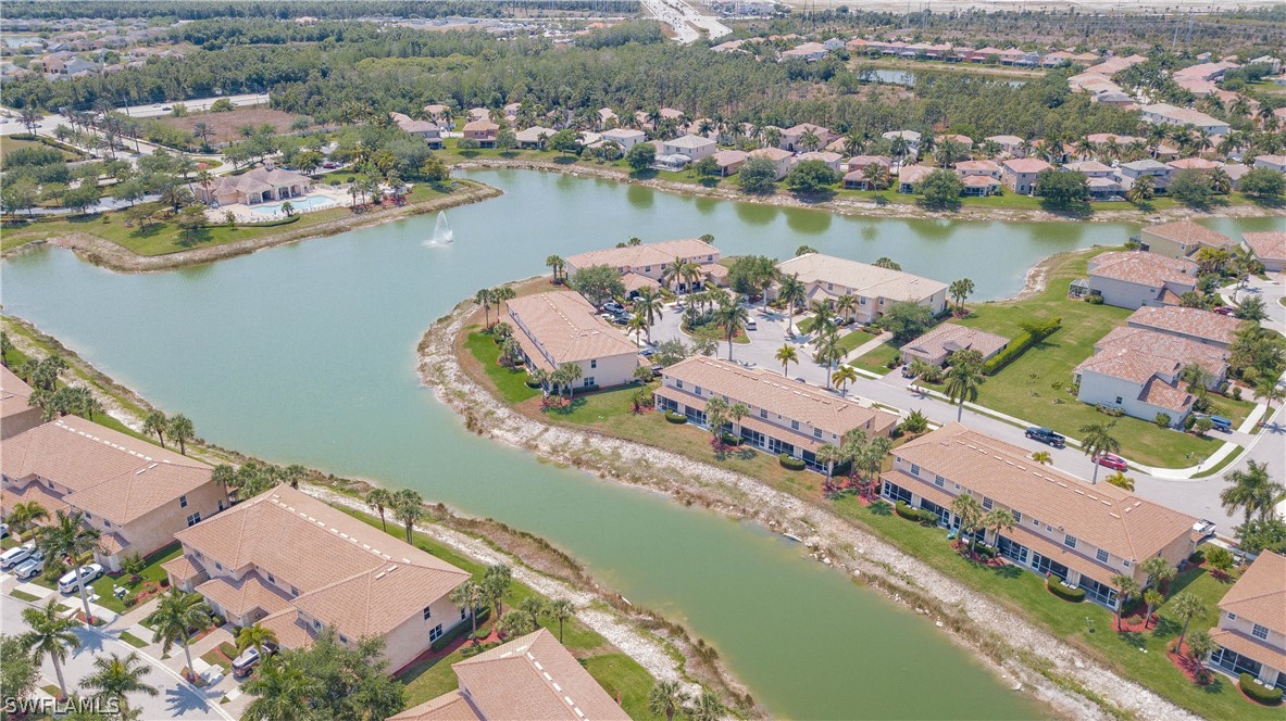 11731 Eros Road Lehigh Acres, FL 33971 - Photo 4 of 33 an aerial view of a city with lake view