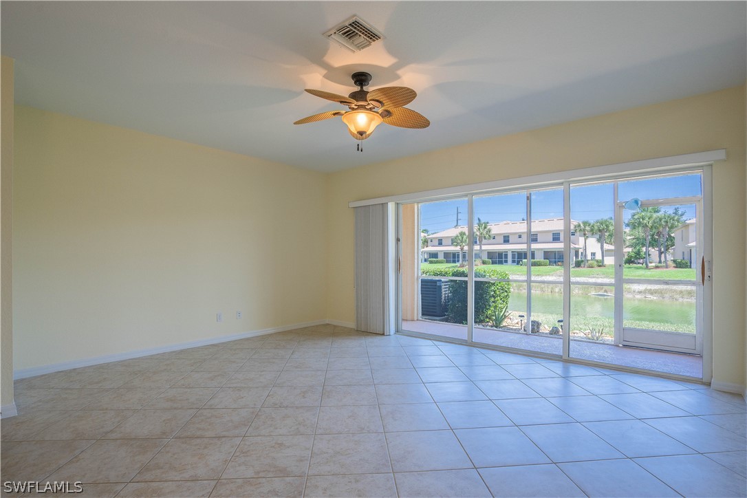 11731 Eros Road Lehigh Acres, FL 33971 - Photo 9 of 33 a view of a window in a room