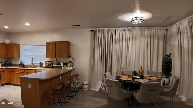 a room with furniture and wooden floor