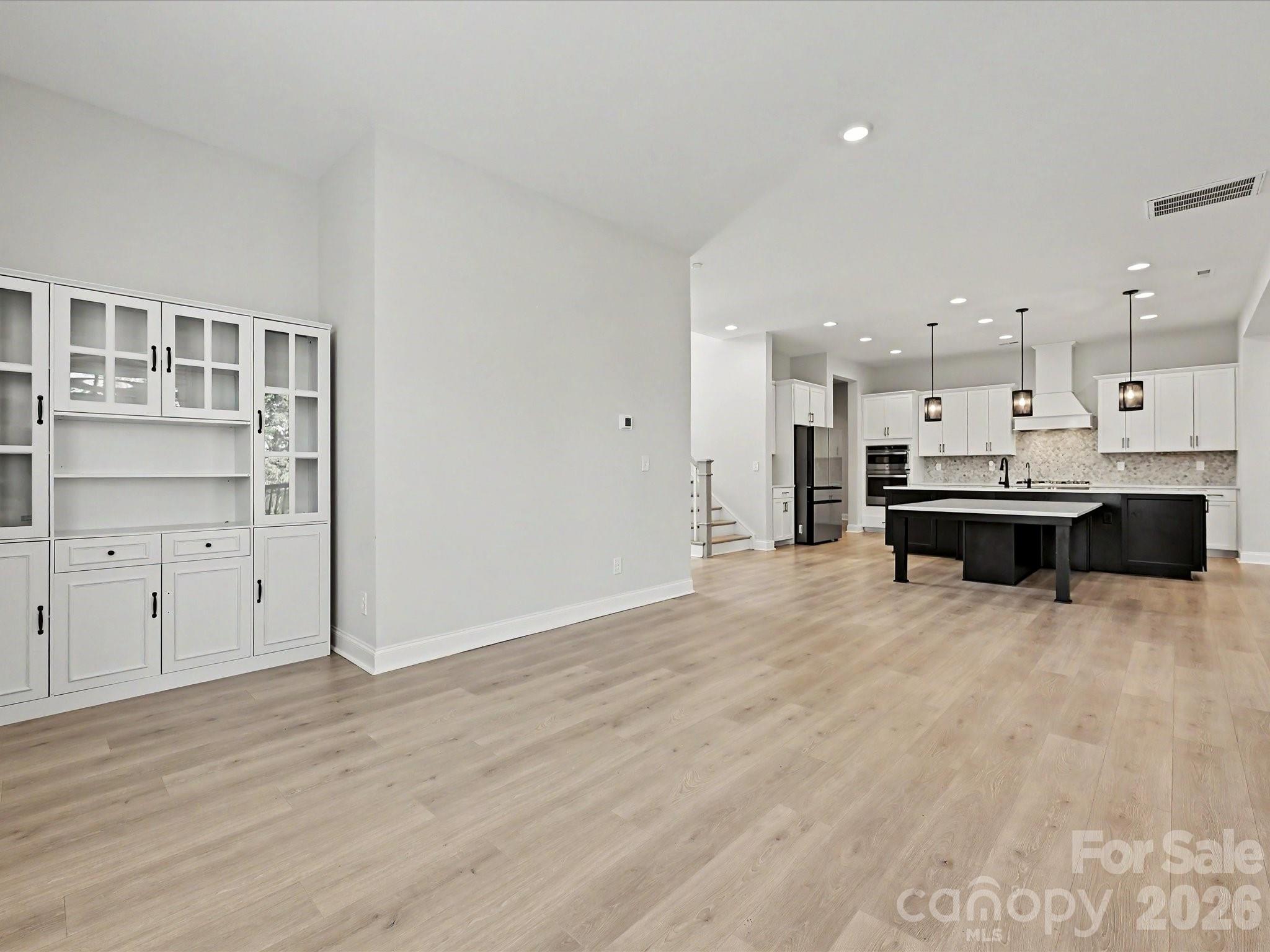 315 West Waterlynn Road Mooresville, NC 28117 - Photo 11 of 46 a view of kitchen with wooden cabinet