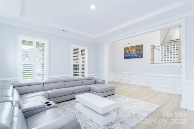 a living room with furniture and a couch