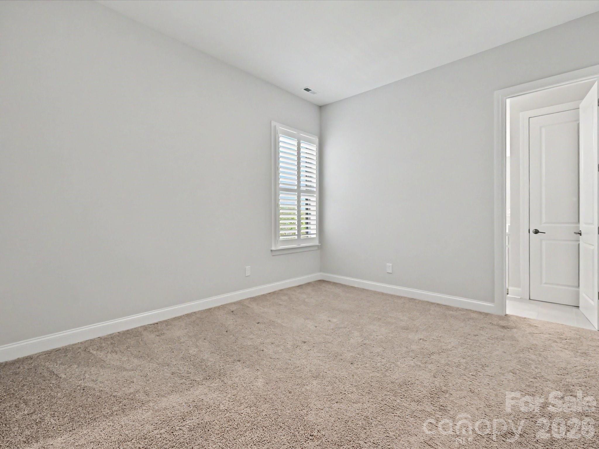 315 West Waterlynn Road Mooresville, NC 28117 - Photo 24 of 46 an empty room with windows
