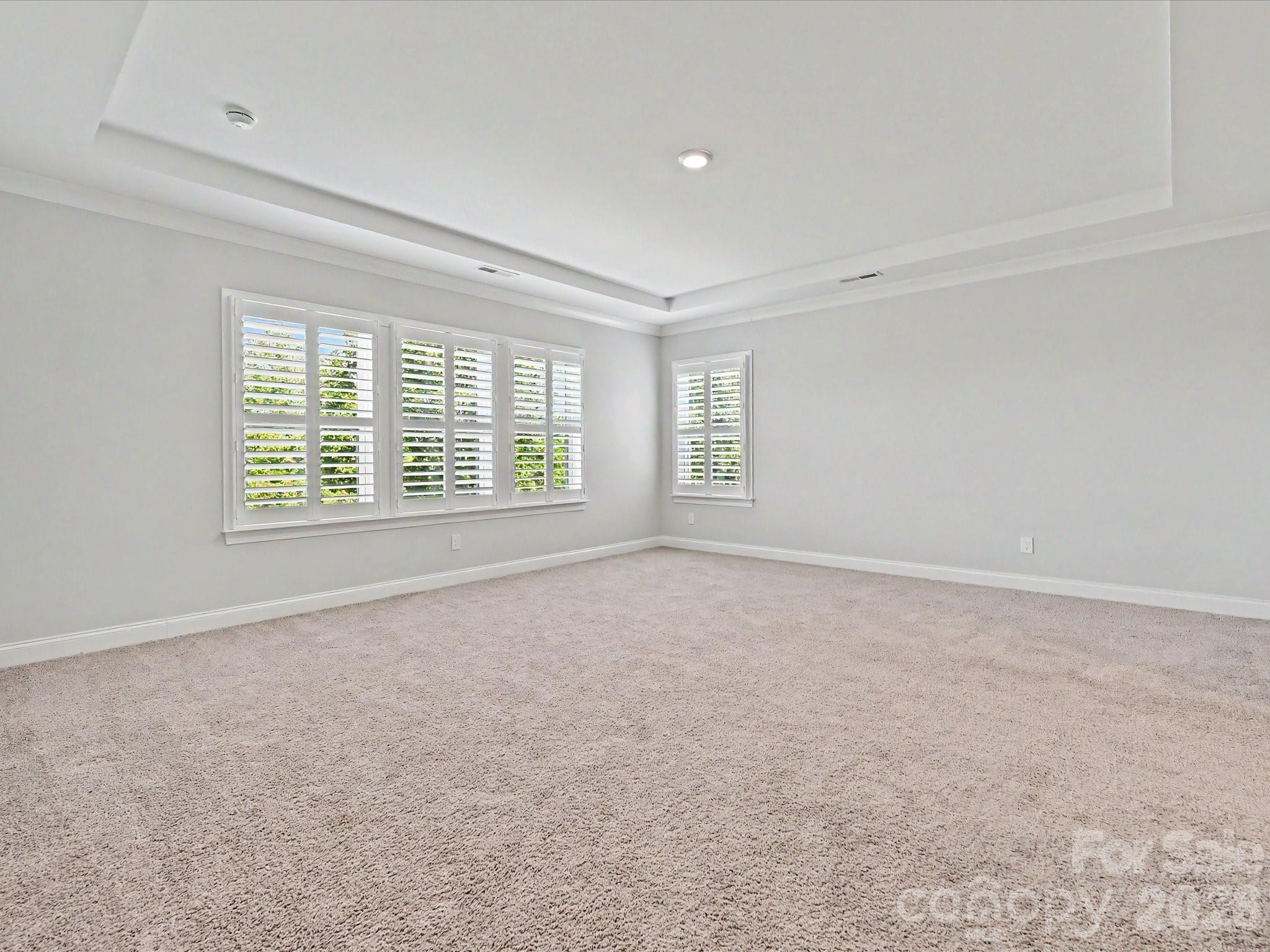 315 West Waterlynn Road Mooresville, NC 28117 - Photo 28 of 46 an empty room with windows
