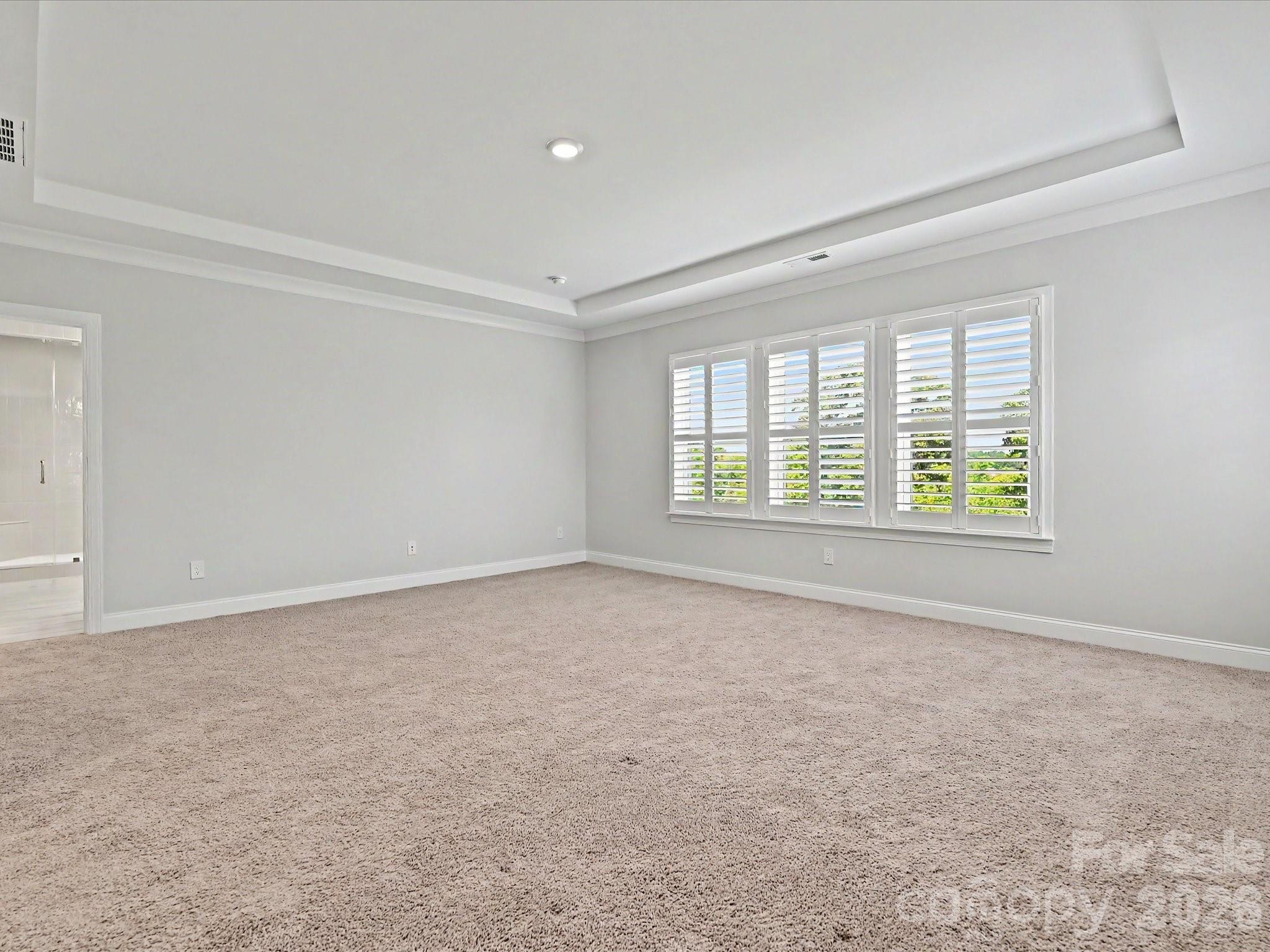 315 West Waterlynn Road Mooresville, NC 28117 - Photo 29 of 46 an empty room with windows