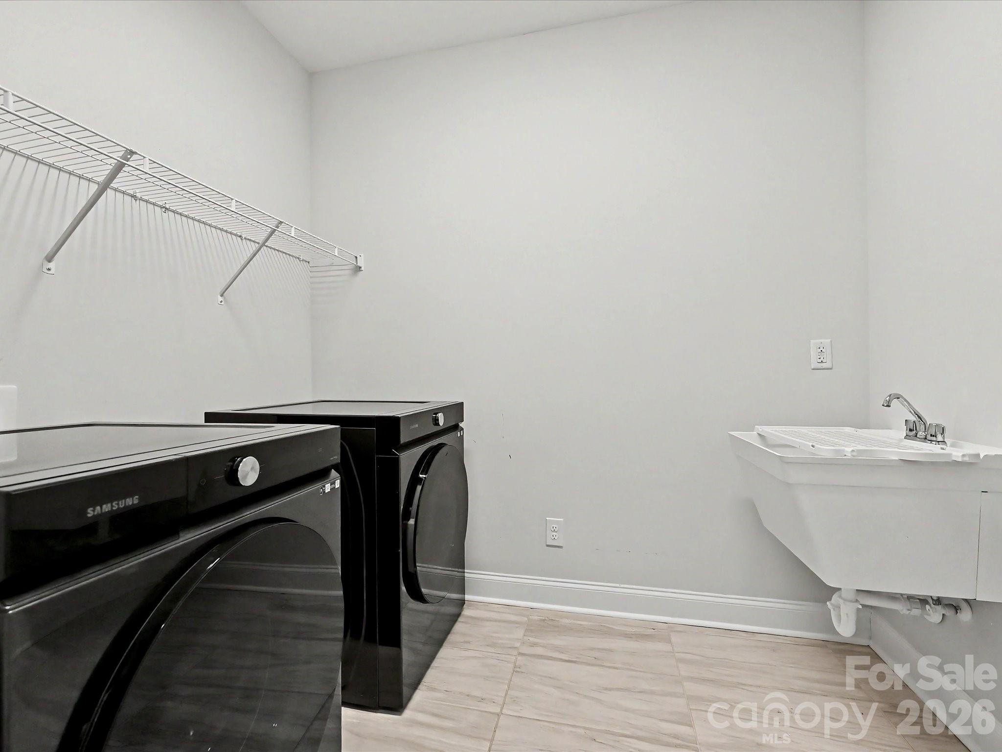 315 West Waterlynn Road Mooresville, NC 28117 - Photo 32 of 46 a bathroom with a sink and a mirror