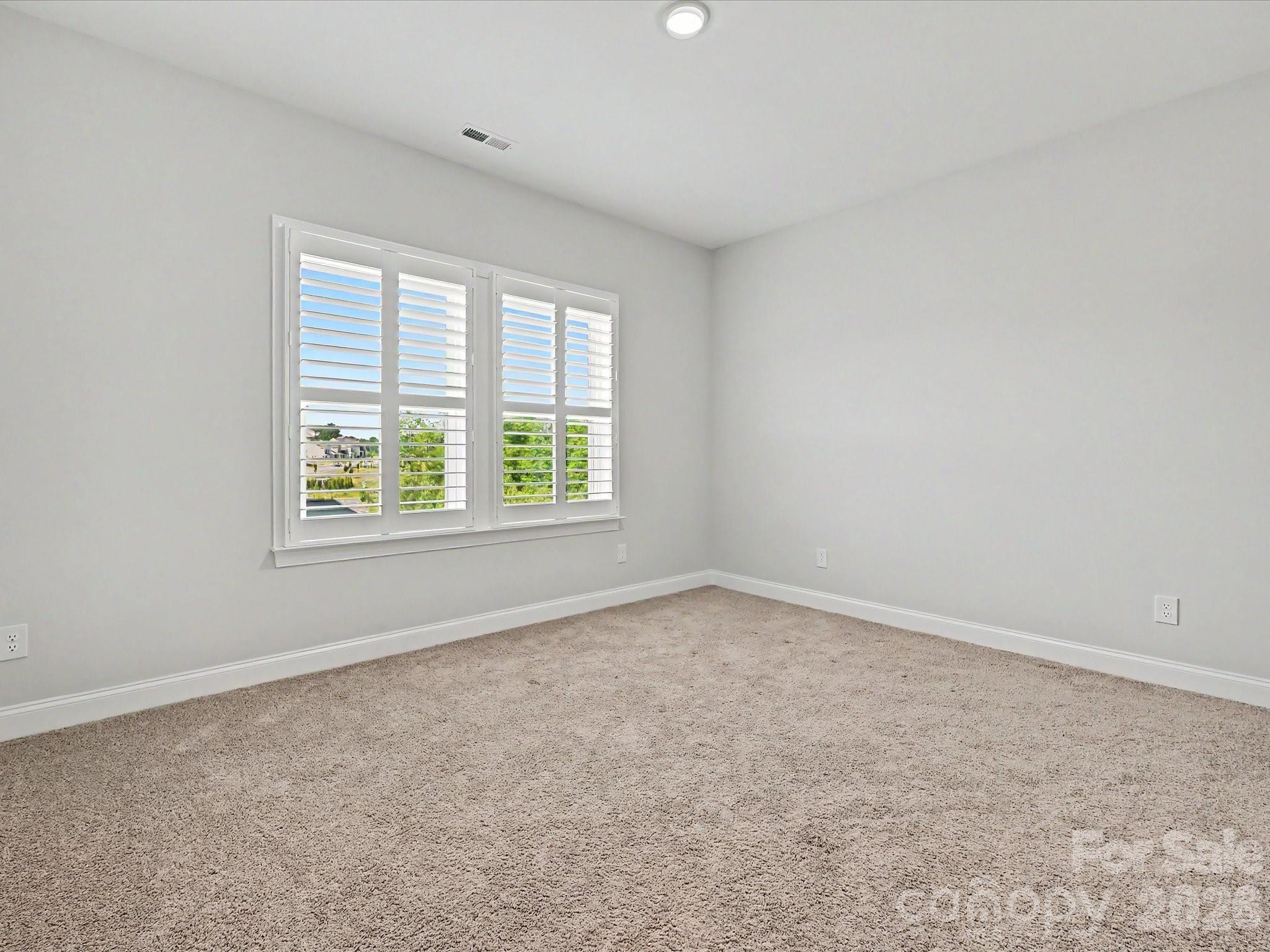 315 West Waterlynn Road Mooresville, NC 28117 - Photo 33 of 46 an empty room with a window