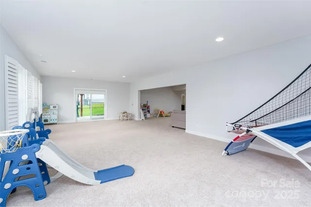 a bed room with furniture and a window