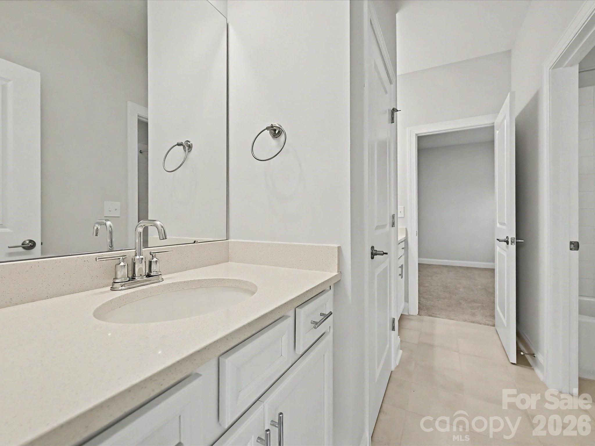 315 West Waterlynn Road Mooresville, NC 28117 - Photo 36 of 46 a bathroom with a sink and a mirror