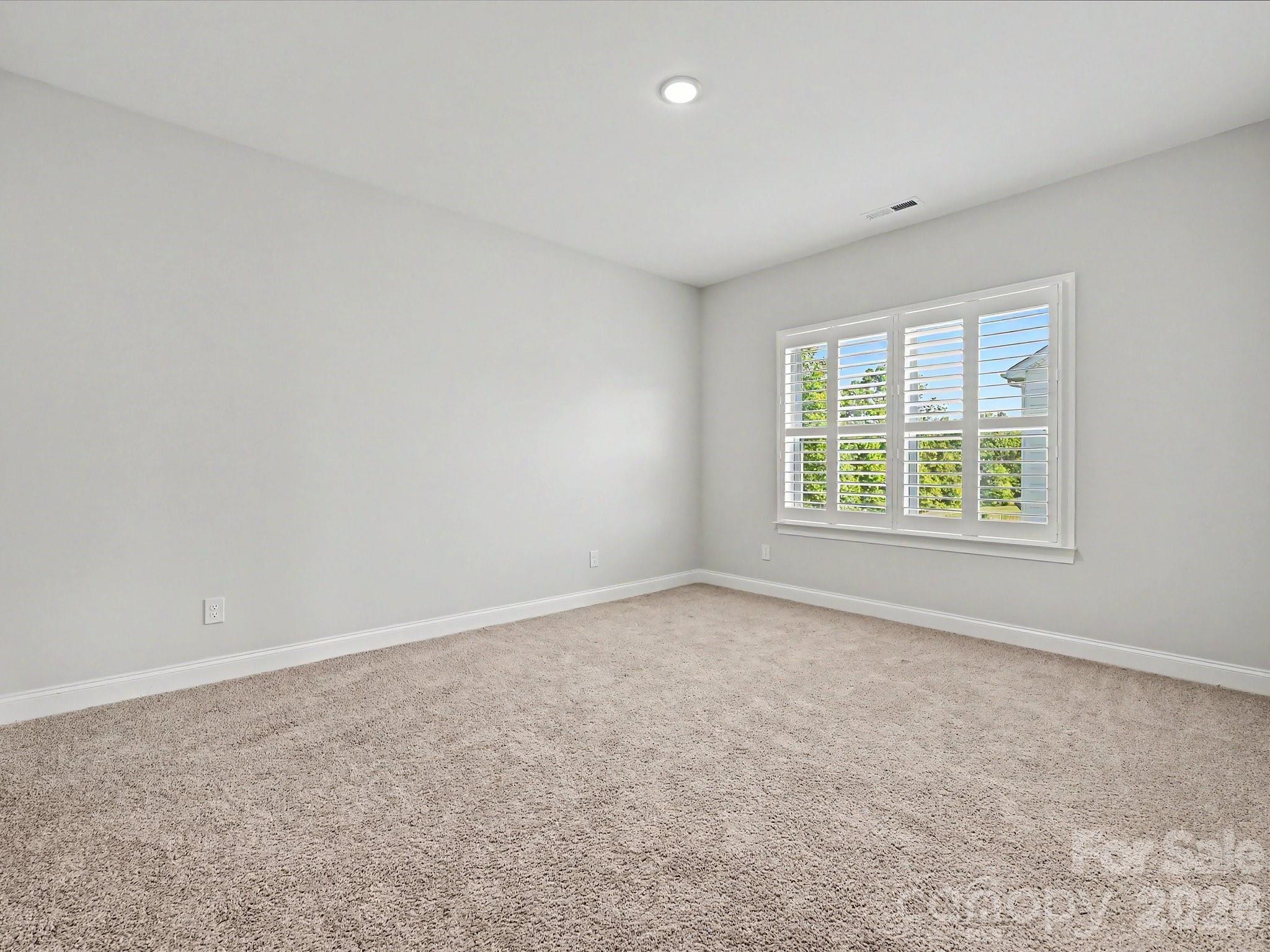 315 West Waterlynn Road Mooresville, NC 28117 - Photo 38 of 46 an empty room with windows