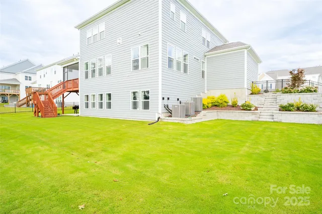a view of a house with a swimming pool